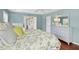 Main bedroom with a queen bed, matching dressers, and a view of the en-suite bathroom through the doorway at 100 Wentbridge Rd, Cary, NC 27519