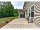 Relaxing backyard patio with outdoor seating, perfect for enjoying the serene green space at 1024 Holland Bend Dr Dr, Cary, NC 27519