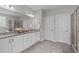 Beautiful bathroom with double vanity, granite countertops, and tiled floors at 1024 Holland Bend Dr Dr, Cary, NC 27519