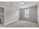 Carpeted bedroom with a view of an attached bathroom at 1024 Holland Bend Dr Dr, Cary, NC 27519