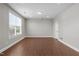 Well-lit room with vinyl floors and a large window providing plenty of natural light at 1024 Holland Bend Dr Dr, Cary, NC 27519