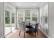 Bright breakfast nook with lots of windows and a sliding glass door at 1024 Holland Bend Dr Dr, Cary, NC 27519