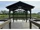 Close-up inside the dock gazebo showcasing serene lake views, perfect for relaxation and outdoor enjoyment at 1024 Holland Bend Dr Dr, Cary, NC 27519