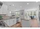 Spacious kitchen featuring granite countertops, stainless appliances, and an adjacent dining area at 1024 Holland Bend Dr Dr, Cary, NC 27519