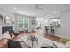 Spacious living room with fireplace, plush seating, and open access to the kitchen at 1024 Holland Bend Dr Dr, Cary, NC 27519