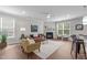 Bright living room with fireplace, neutral color palette, and an open layout at 1024 Holland Bend Dr Dr, Cary, NC 27519