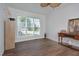 Home office featuring hardwood floors, large windows offering ample natural light, and neutral walls at 1056 Evening Shade Ave, Rolesville, NC 27571