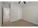 Bedroom featuring carpet floors, a ceiling fan, and a closet at 107 Governors House Dr, Morrisville, NC 27560