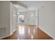 Open foyer showcasing wood floors and natural light from the large window at 107 Governors House Dr, Morrisville, NC 27560