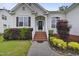 Inviting front porch with a wreath and pretty landscaping at 107 Governors House Dr, Morrisville, NC 27560