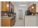 Stylish kitchen with a tile backsplash and modern appliances at 107 Governors House Dr, Morrisville, NC 27560