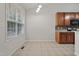Eat-in kitchen with tile floors and lots of natural light at 107 Governors House Dr, Morrisville, NC 27560