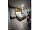 Bedroom with a bed and additional furniture at 109 N 2Nd St, Sanford, NC 27330