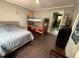 Bedroom with bunk beds, hardwood floors, and single bed at 109 N 2Nd St, Sanford, NC 27330