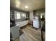 The home's kitchen includes an oven, sink, refrigerator, and hardwood flooring at 109 N 2Nd St, Sanford, NC 27330