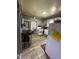 The home's kitchen includes an oven, sink, refrigerator, and hardwood flooring at 109 N 2Nd St, Sanford, NC 27330
