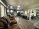 Spacious living room featuring hardwood floors, a fireplace, and comfortable seating at 109 N 2Nd St, Sanford, NC 27330