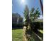 Charming yard space with potential for gardening or outdoor enjoyment, surrounded by trees and greenery at 109 N 2Nd St, Sanford, NC 27330