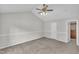 Spacious bedroom with vaulted ceilings, neutral carpet, and a ceiling fan at 113 Feezor Ct, Clayton, NC 27527