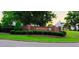 An attractive brick sign with green landscaping welcomes residents to Riverwood Golf Club at 113 Feezor Ct, Clayton, NC 27527