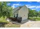 Charming two-story home featuring an attached garage, landscaped yard, and a well-manicured lawn at 113 Feezor Ct, Clayton, NC 27527