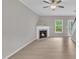 Bright living room featuring a marble fireplace and easy access to the outdoor patio at 113 Feezor Ct, Clayton, NC 27527