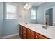 Bright bathroom boasts a double vanity, large mirror, updated fixtures and a spacious layout at 120 Tanager Farms Dr, Youngsville, NC 27596