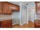 Well-appointed kitchen boasts wooden cabinets, granite countertops and an eat-in area at 120 Tanager Farms Dr, Youngsville, NC 27596