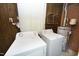 Laundry room featuring washer, dryer, and a water heater at 1209 Landon St, Durham, NC 27703