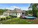 Beautiful home featuring a spacious backyard with a pool, deck, and manicured lawn, ideal for outdoor entertainment at 1412 Wakefield Farm Rd, Zebulon, NC 27597