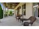 Relaxing front porch with seating and charming architectural details at 1412 Wakefield Farm Rd, Zebulon, NC 27597