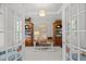 Charming home office with built-in bookcases and ample natural light at 1412 Wakefield Farm Rd, Zebulon, NC 27597