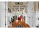 Inviting foyer with hardwood floors flows into a living space with coffered ceilings at 14393 Nc Hwy 96 N, Zebulon, NC 27597