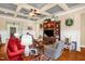 Spacious living room featuring a neutral color palette, hardwood floors, and custom built-ins at 14393 Nc Hwy 96 N, Zebulon, NC 27597