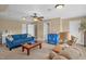Large living room offers comfortable seating, a ceiling fan, and plenty of space for relaxation at 14393 Nc Hwy 96 N, Zebulon, NC 27597
