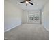 A bright, carpeted bedroom with large windows that let in plenty of natural light at 1466 Salem Creek Dr, Apex, NC 27502