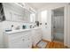 Bathroom featuring double sinks, white cabinetry, and a shower with curtain at 16 Tottenham Ln # 16, Chapel Hill, NC 27517