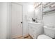 Bathroom with white cabinets, tile backsplash, and tiled floors at 16 Tottenham Ln # 16, Chapel Hill, NC 27517