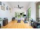 Spacious exercise room with hardwood floors and large windows overlooking nature at 16 Tottenham Ln # 16, Chapel Hill, NC 27517
