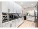 Contemporary kitchen showcasing sleek cabinetry, granite counters, and stainless steel appliances for a modern touch at 16 Tottenham Ln # 16, Chapel Hill, NC 27517