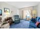 Inviting living room with a large window, comfortable seating, and a relaxing atmosphere at 1641 Regency Dr, Burlington, NC 27215