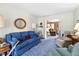 Comfortable living room with a sofa, chair, and view to a cozy Gathering room at 1641 Regency Dr, Burlington, NC 27215