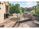 Brick patio area with outdoor dining set and backyard views at 1641 Regency Dr, Burlington, NC 27215