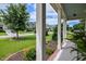Inviting porch view with column and well-maintained landscaping at 18 Heathgreen Dr, Clayton, NC 27527