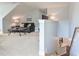 Inviting living room with a comfortable leather sofa and a stylish coffee table near the staircase at 18 Heathgreen Dr, Clayton, NC 27527