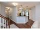 Open-concept living space with a kitchen and dining area, perfect for entertaining and modern living at 18 Heathgreen Dr, Clayton, NC 27527