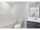 Bright bathroom with a shower and tub at 1916 Fishamble # 21, Fuquay Varina, NC 27526
