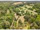 Beautiful aerial view showcasing the property's expansive land at 197 Country Routt Brown Rd, Pittsboro, NC 27312