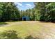 Blue barn featuring covered sides at 197 Country Routt Brown Rd, Pittsboro, NC 27312