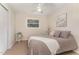 Cozy bedroom with a ceiling fan, window, neutral tones, and comfortable carpet at 197 Country Routt Brown Rd, Pittsboro, NC 27312